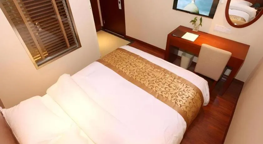 Bed in GreenTree Inn Shanghai Songjiang WanDa Plaza RonGMEi Road Express Hotel
