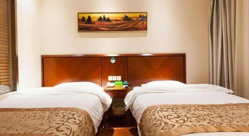 Bed in GreenTree Inn Shanghai Songjiang WanDa Plaza RonGMEi Road Express Hotel