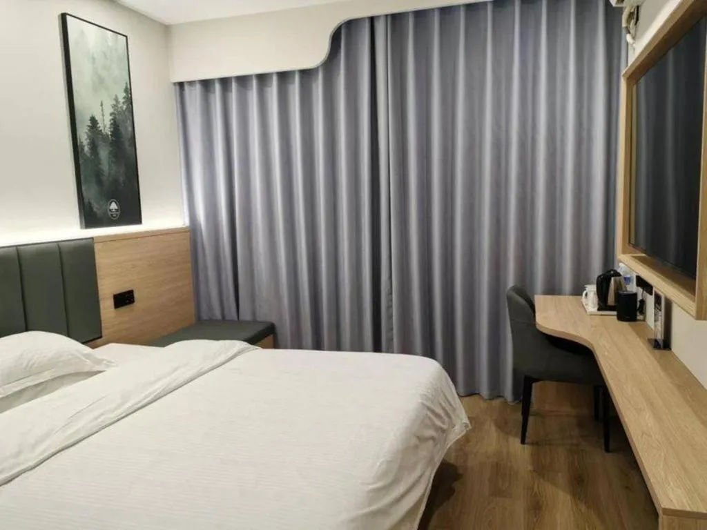 Bed in GreenTree Inn Shanghai Songjiang WanDa Plaza RonGMEi Road Express Hotel
