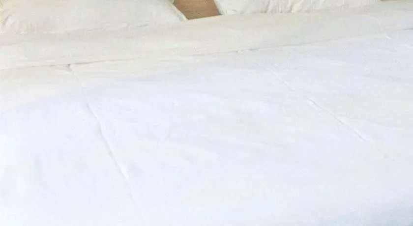 Bed in GreenTree Inn Shanghai Songjiang WanDa Plaza RonGMEi Road Express Hotel