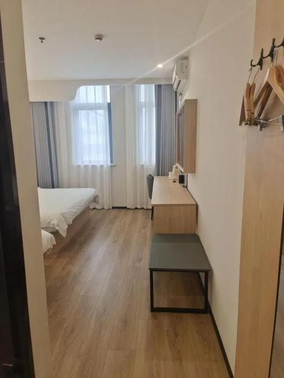 Bed in GreenTree Inn Shanghai Songjiang WanDa Plaza RonGMEi Road Express Hotel