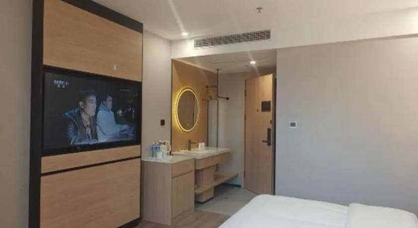 Bed in GreenTree Inn Shanghai Songjiang WanDa Plaza RonGMEi Road Express Hotel