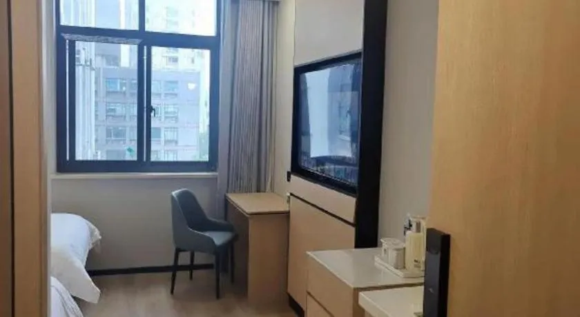 Bed in GreenTree Inn Shanghai Songjiang WanDa Plaza RonGMEi Road Express Hotel