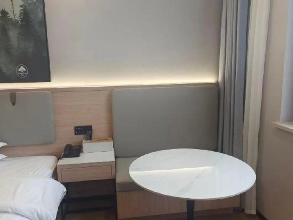 Bed in GreenTree Inn Shanghai Songjiang WanDa Plaza RonGMEi Road Express Hotel