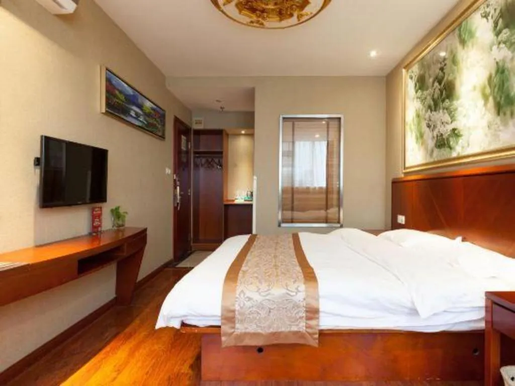 Bed in GreenTree Inn Shanghai Songjiang WanDa Plaza RonGMEi Road Express Hotel