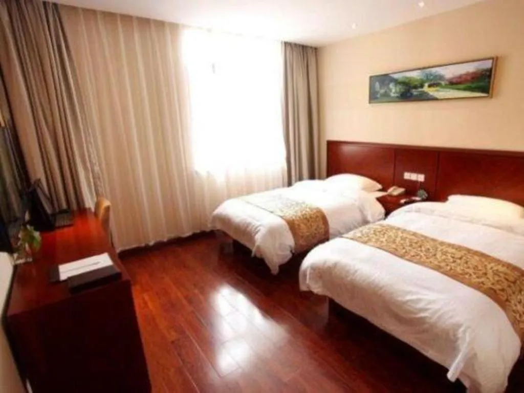 Bed in GreenTree Inn Shanghai Songjiang WanDa Plaza RonGMEi Road Express Hotel