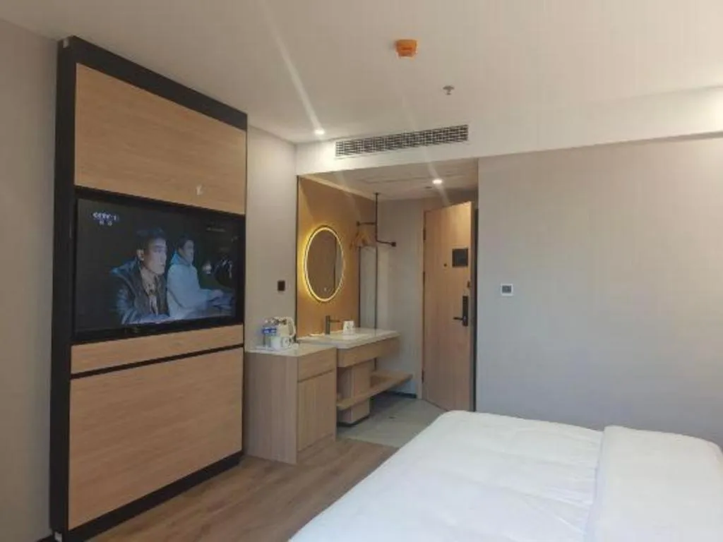 Bed in GreenTree Inn Shanghai Songjiang WanDa Plaza RonGMEi Road Express Hotel