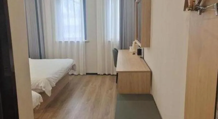 Bed in GreenTree Inn Shanghai Songjiang WanDa Plaza RonGMEi Road Express Hotel