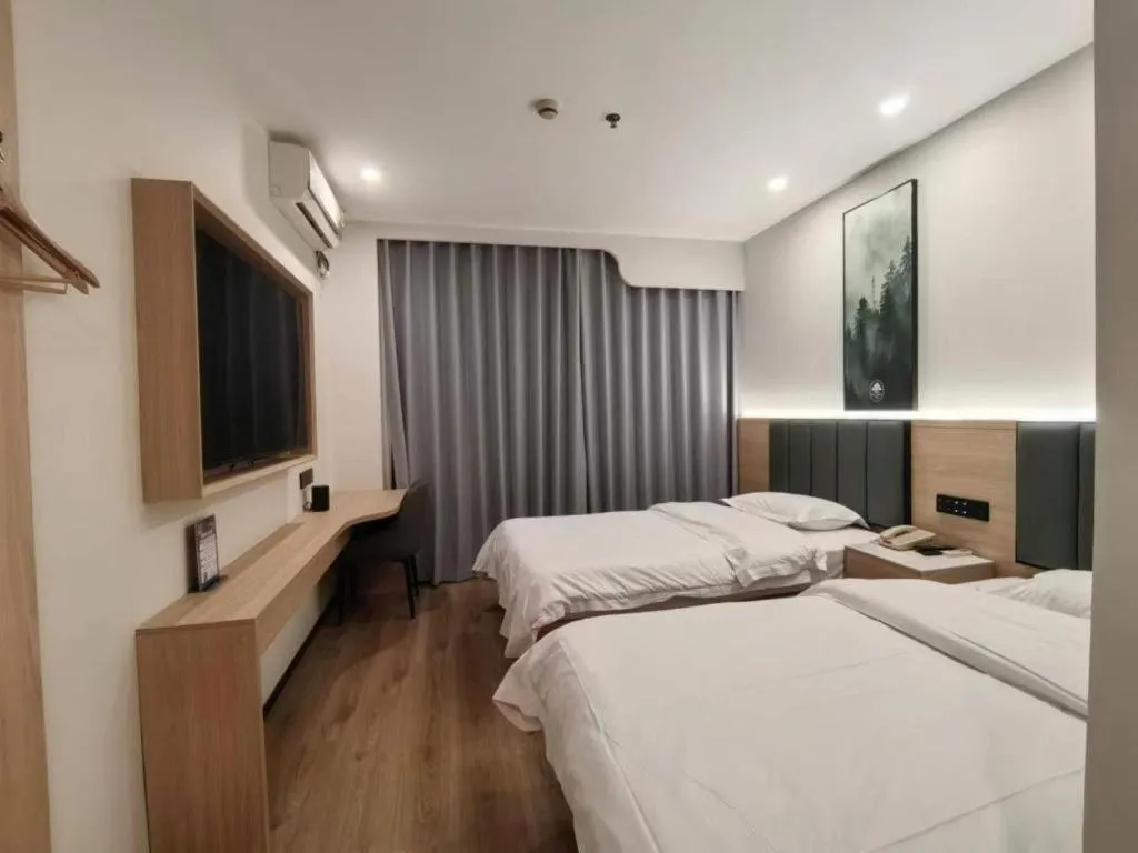 Bed in GreenTree Inn Shanghai Songjiang WanDa Plaza RonGMEi Road Express Hotel