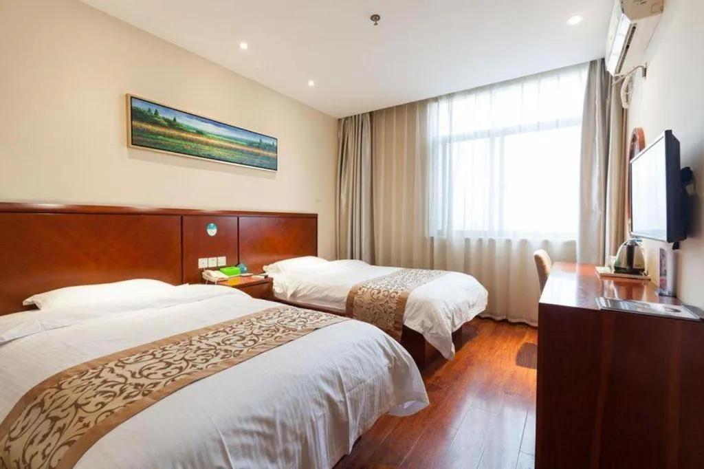 Bed in GreenTree Inn Shanghai Songjiang WanDa Plaza RonGMEi Road Express Hotel