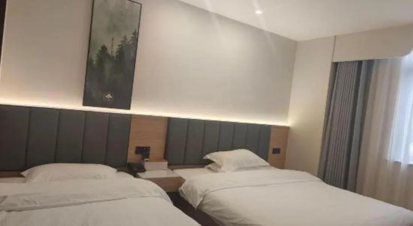 Bed in GreenTree Inn Shanghai Songjiang WanDa Plaza RonGMEi Road Express Hotel