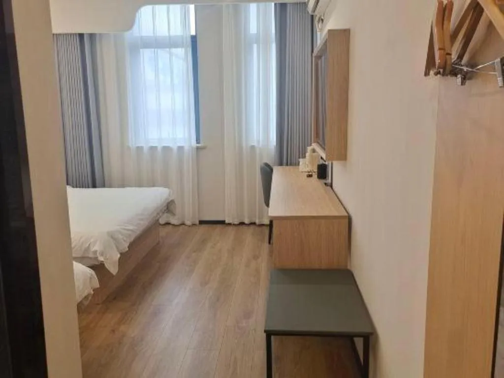 Bed in GreenTree Inn Shanghai Songjiang WanDa Plaza RonGMEi Road Express Hotel