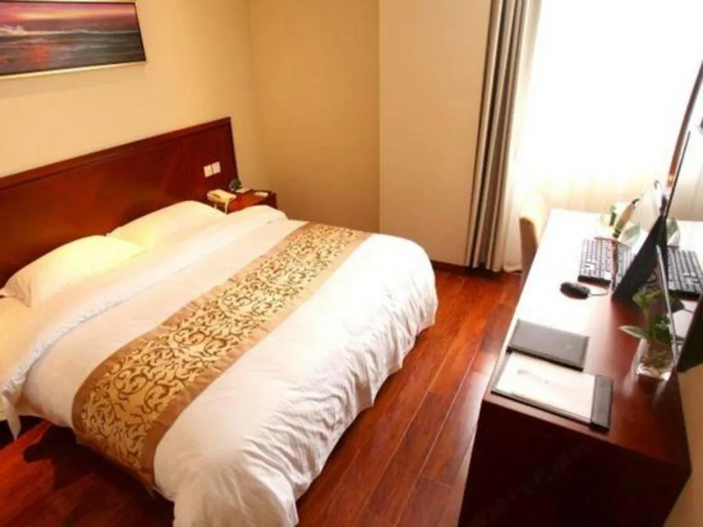 Bed in GreenTree Inn Shanghai Songjiang WanDa Plaza RonGMEi Road Express Hotel