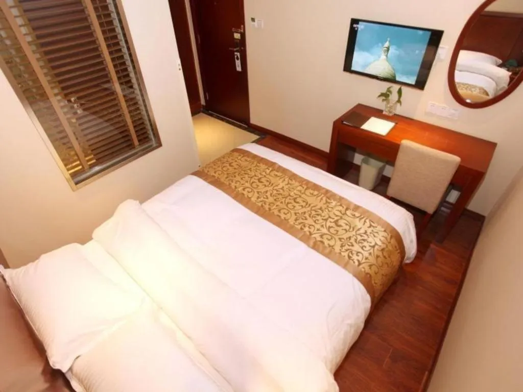 Bed in GreenTree Inn Shanghai Songjiang WanDa Plaza RonGMEi Road Express Hotel