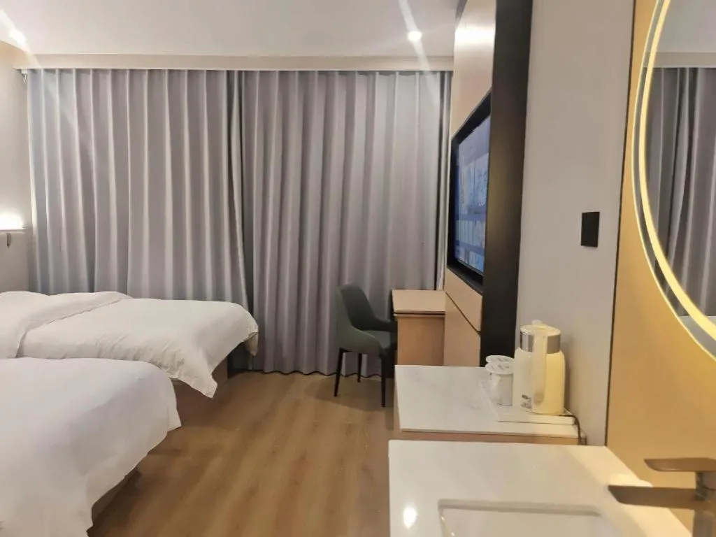 Bed in GreenTree Inn Shanghai Songjiang WanDa Plaza RonGMEi Road Express Hotel