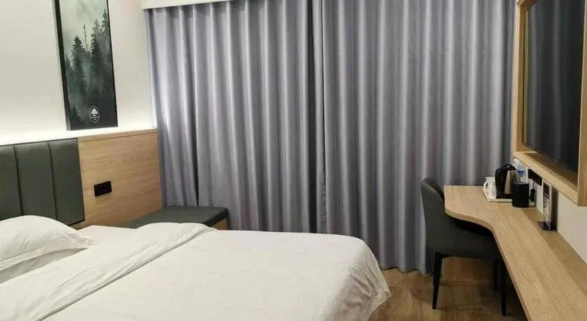 Bed in GreenTree Inn Shanghai Songjiang WanDa Plaza RonGMEi Road Express Hotel