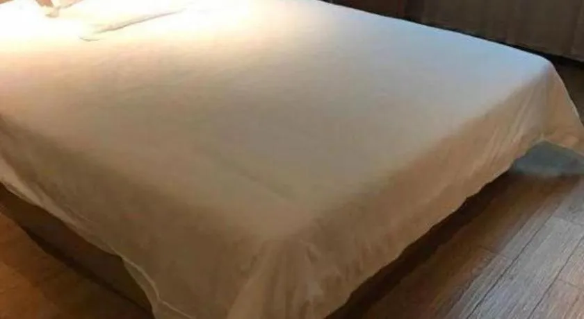 Bed in IU Hotel Changsha Yuanjialing Metro Station 2nd Hospital of Xiangya