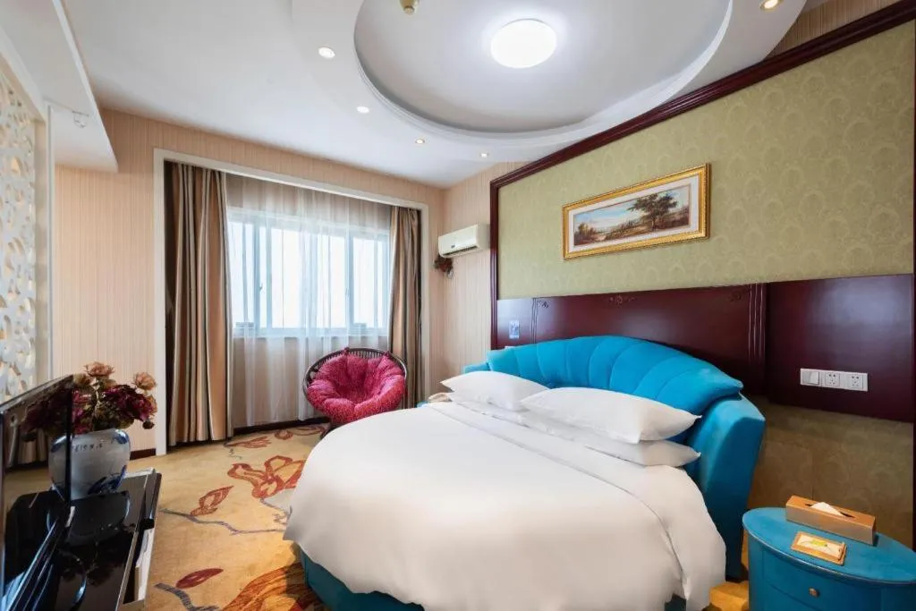 Bed in Vienna Hotel Yangzhou Yangzhou Slender West Lake Wenchangge