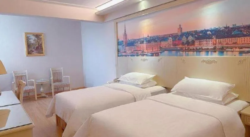 Bed in Vienna Hotel Yangzhou Yangzhou Slender West Lake Wenchangge