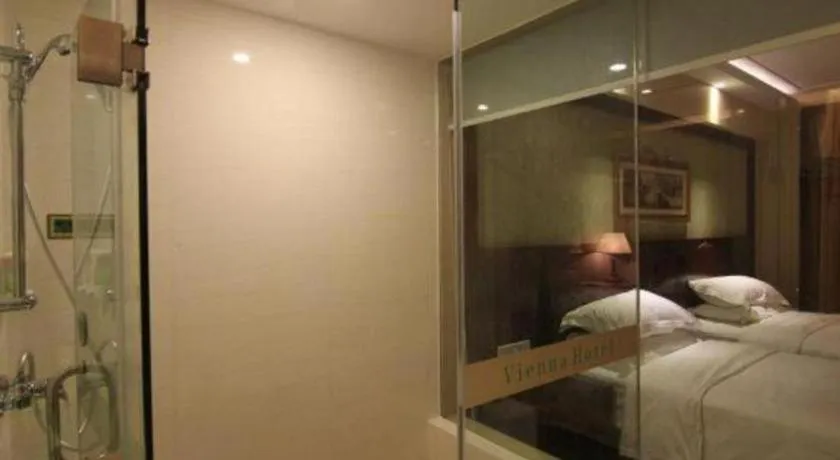 Bed in Vienna Hotel Yangzhou Yangzhou Slender West Lake Wenchangge