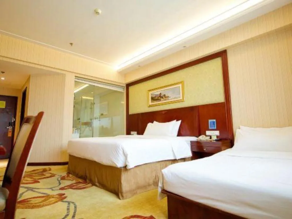 Bed in Vienna Hotel Yangzhou Yangzhou Slender West Lake Wenchangge