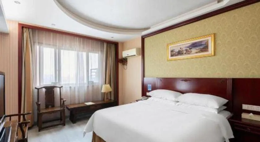 Bed in Vienna Hotel Yangzhou Yangzhou Slender West Lake Wenchangge