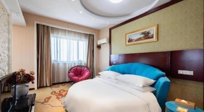 Bed in Vienna Hotel Yangzhou Yangzhou Slender West Lake Wenchangge