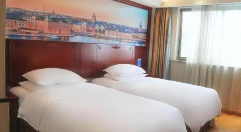Bed in Vienna Hotel Yangzhou Yangzhou Slender West Lake Wenchangge