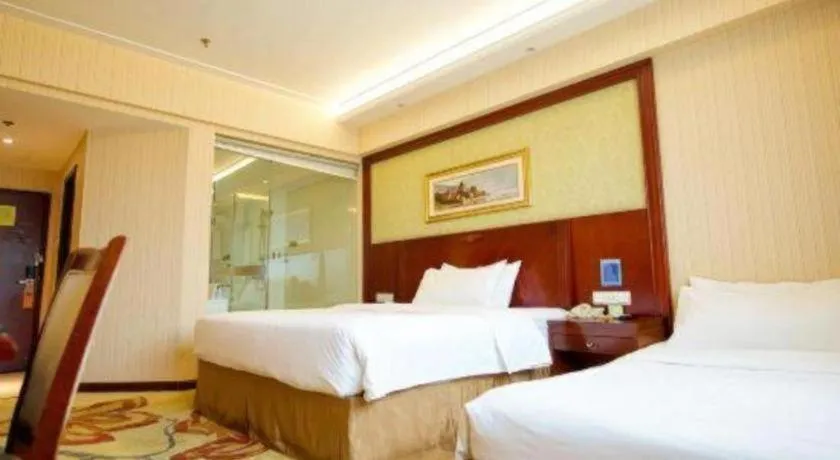 Bed in Vienna Hotel Yangzhou Yangzhou Slender West Lake Wenchangge