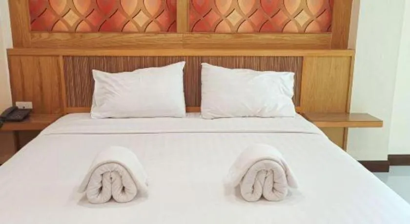 Bed in Mon Muang Hotel