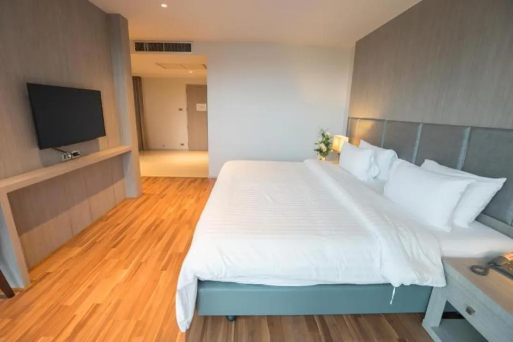 Bed in New Season Square Hotel