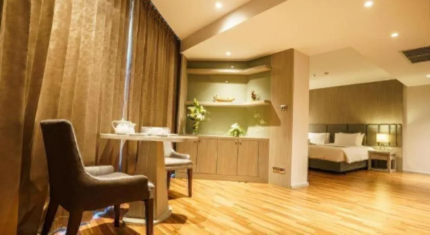 Bed in New Season Square Hotel