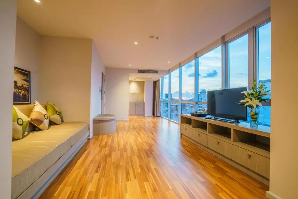 Bed in New Season Square Hotel