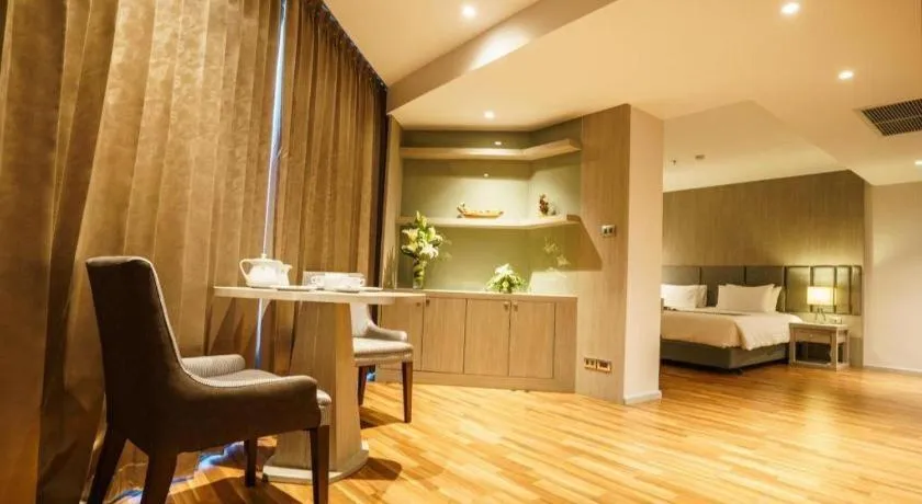 Bed in New Season Square Hotel