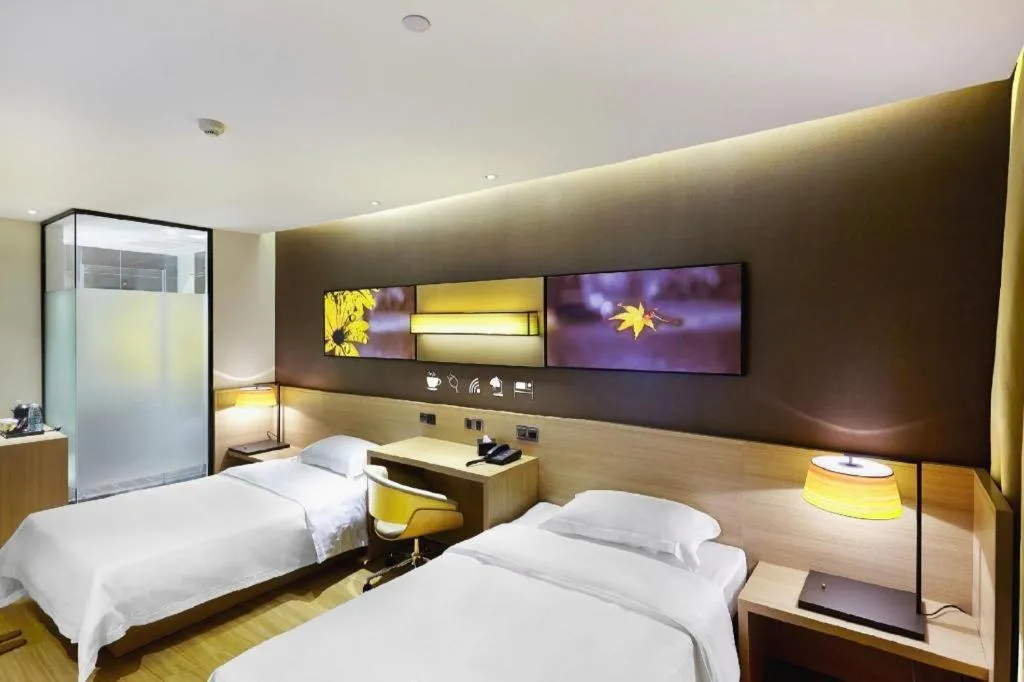 Bed in IU Hotel Guangzhou Taihe Square Branch