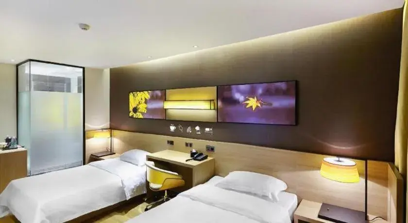 Bed in IU Hotel Guangzhou Taihe Square Branch Bed in IU Hotel Guangzhou Taihe Square Branch