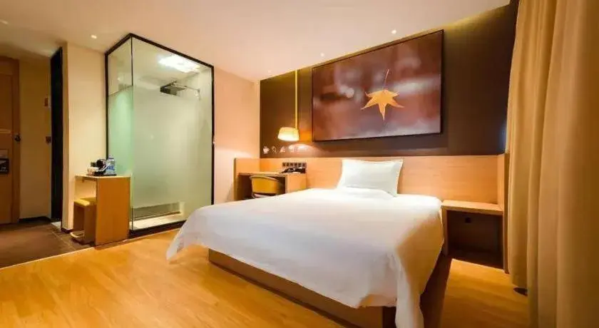 Bed in IU Hotel Guangzhou Taihe Square Branch Bed in IU Hotel Guangzhou Taihe Square Branch
