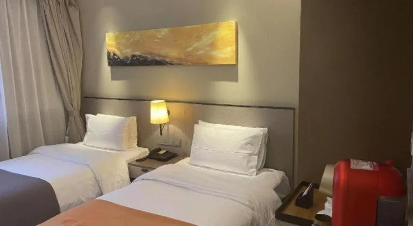 Bed in Home Inn Plus Shanghai Zhangjiang Guanglan Road Metro Station