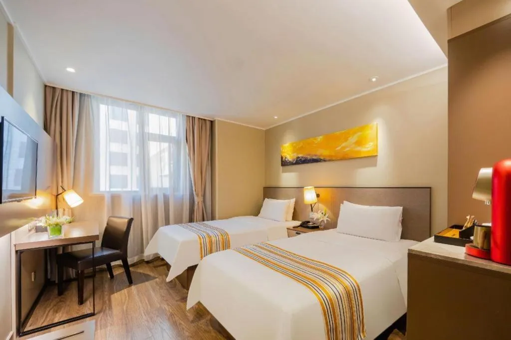 Bed in Home Inn Plus Shanghai Zhangjiang Guanglan Road Metro Station