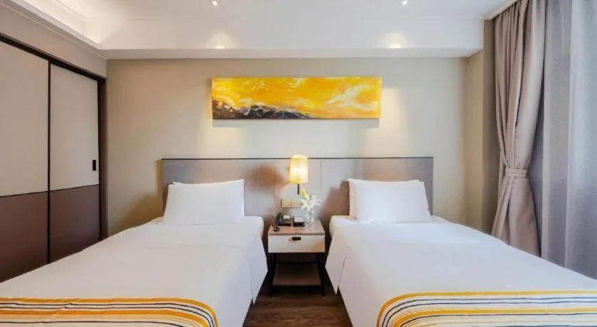 Bed in Home Inn Plus Shanghai Zhangjiang Guanglan Road Metro Station