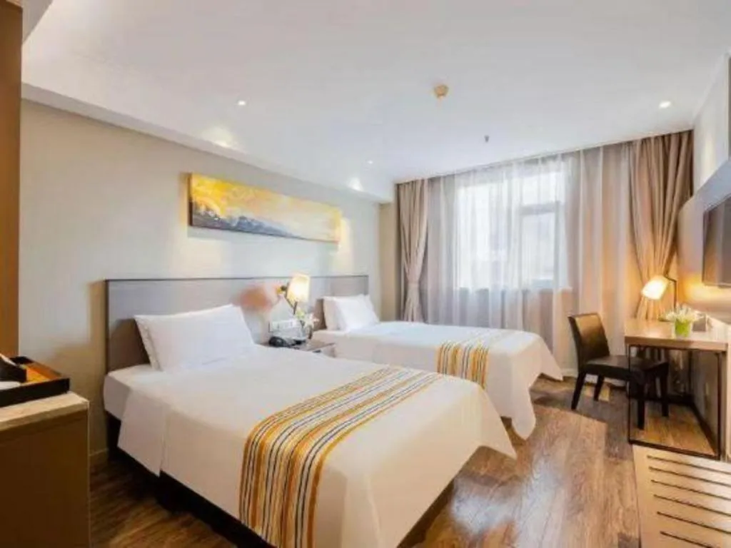 Bed in Home Inn Plus Shanghai Zhangjiang Guanglan Road Metro Station