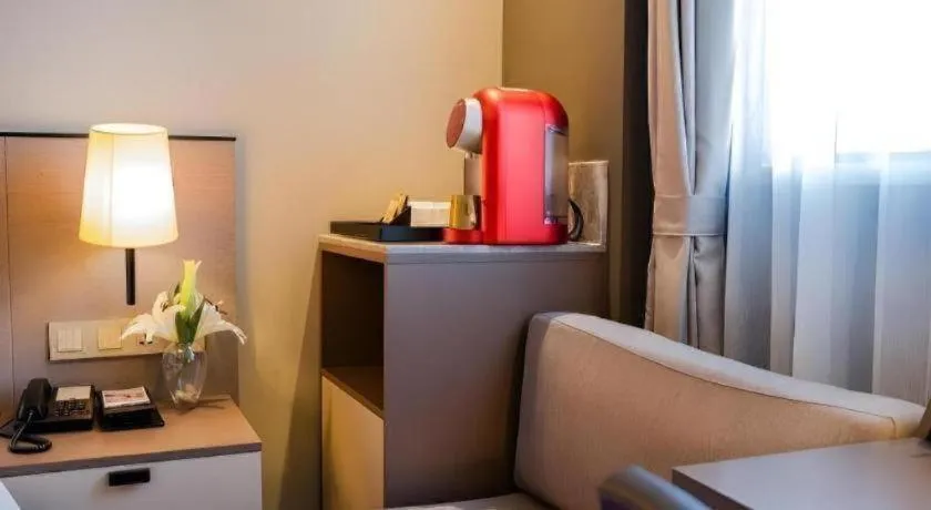 Bed in Home Inn Plus Shanghai Zhangjiang Guanglan Road Metro Station