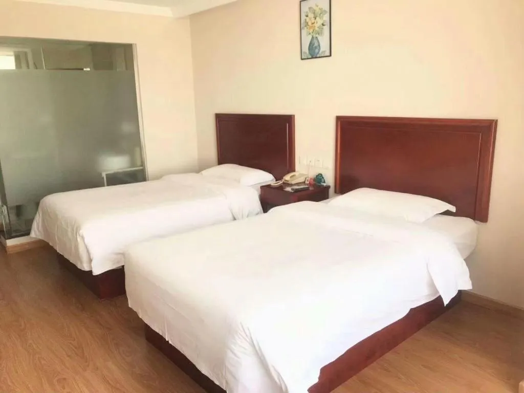 Bed in GreenTree Inn Tianjin JinNan ShuangLin Metro Station Express Hotel