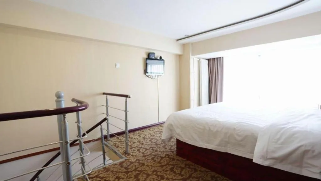 Bed in GreenTree Inn Tianjin JinNan ShuangLin Metro Station Express Hotel