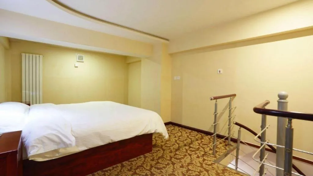 Bed in GreenTree Inn Tianjin JinNan ShuangLin Metro Station Express Hotel