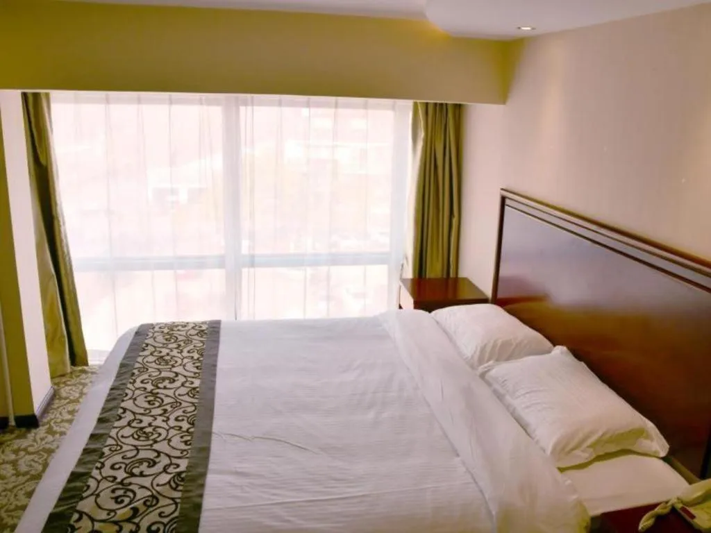 Bed in GreenTree Inn Tianjin JinNan ShuangLin Metro Station Express Hotel