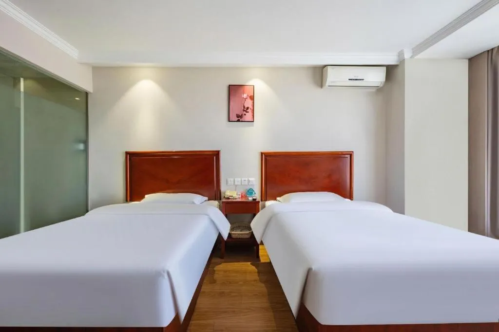 Bed in GreenTree Inn Tianjin JinNan ShuangLin Metro Station Express Hotel