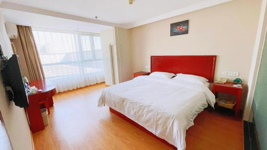 Bed in GreenTree Inn Tianjin JinNan ShuangLin Metro Station Express Hotel