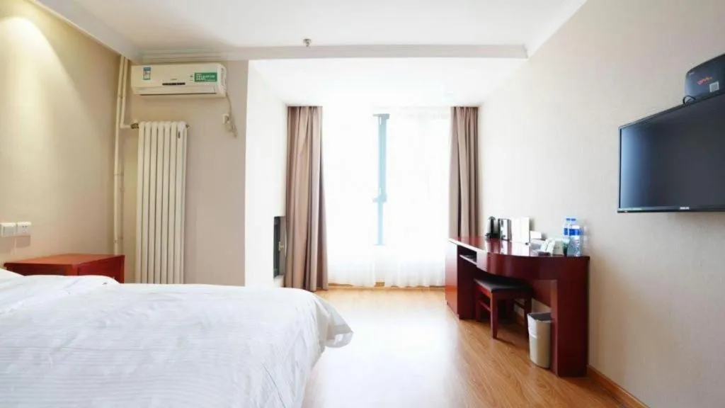 Bed in GreenTree Inn Tianjin JinNan ShuangLin Metro Station Express Hotel