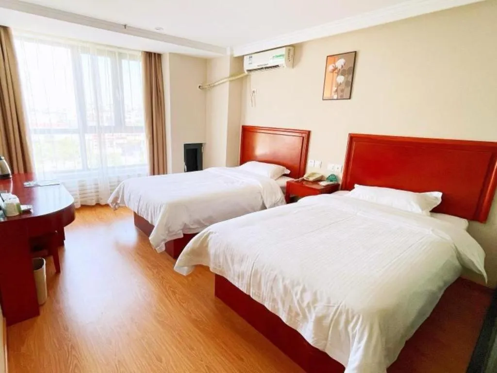 Bed in GreenTree Inn Tianjin JinNan ShuangLin Metro Station Express Hotel